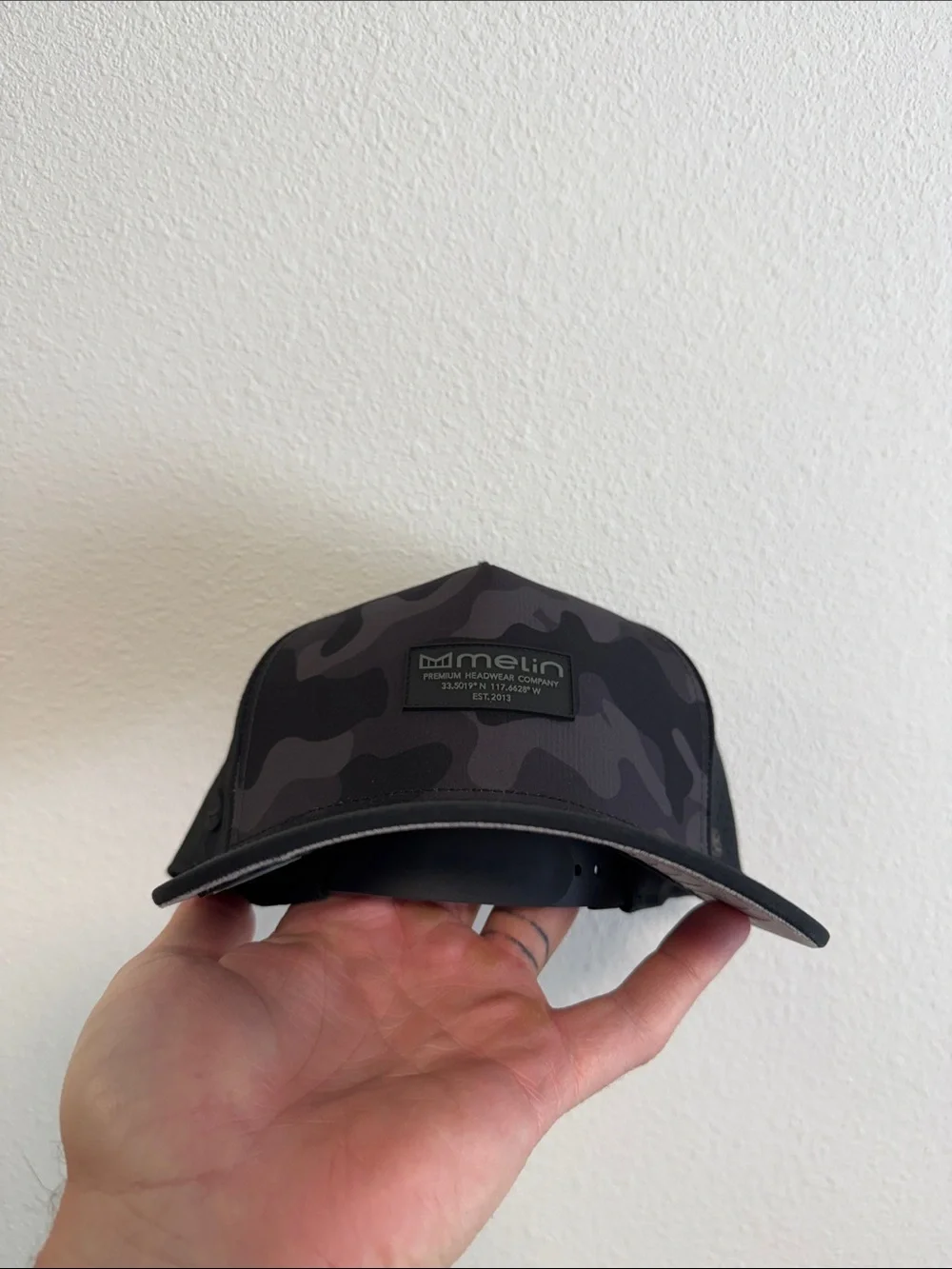 Melin Men’s Black Camouflage Trucker Hat